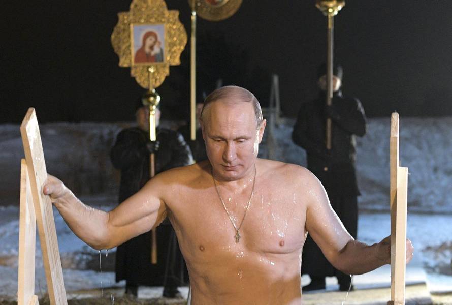 Russian President Putin takes a dip in the freezing waters of Lake Seliger during Orthodox Epiphany celebrations in Tver region