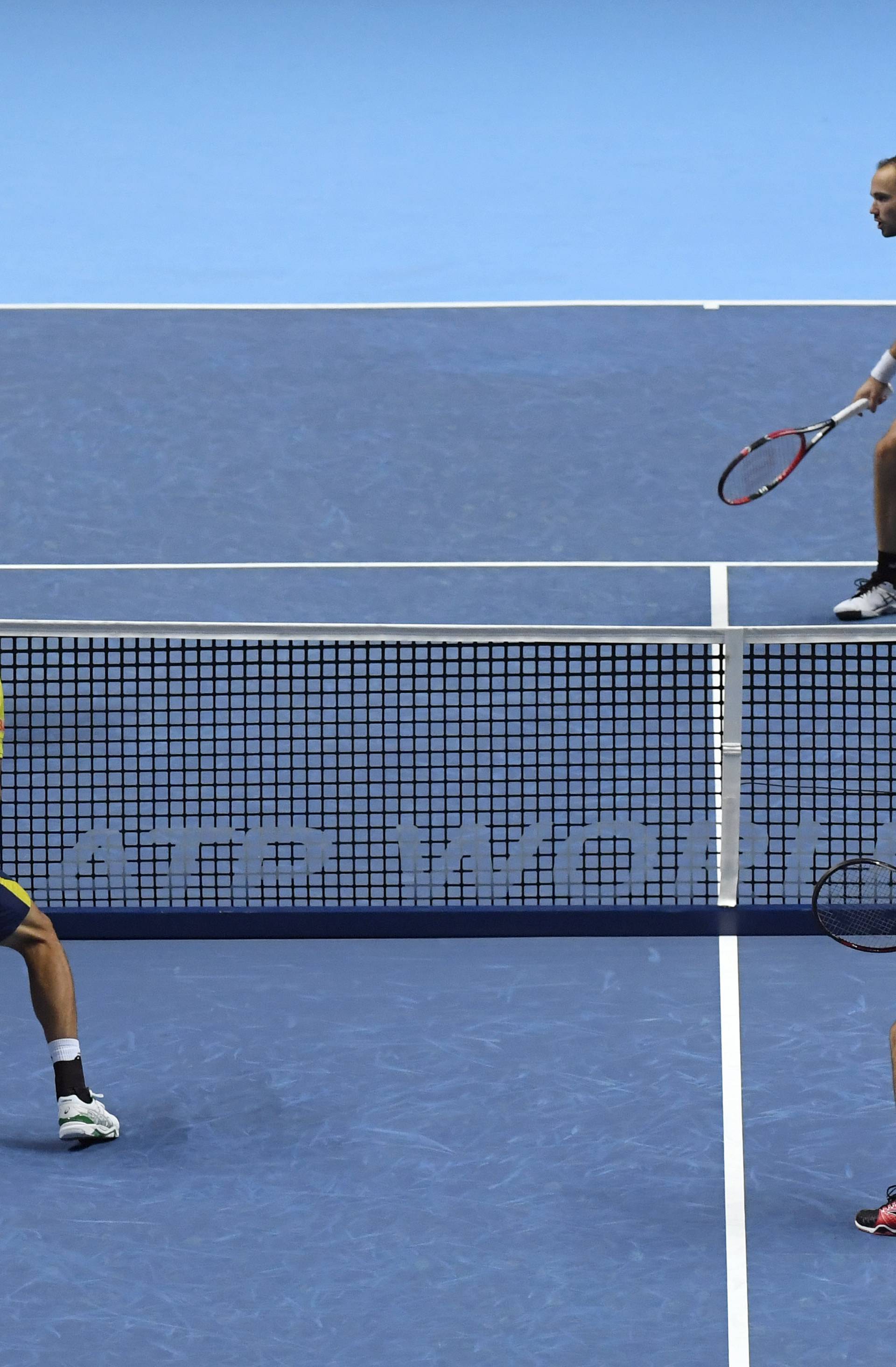 Great Britain's Jamie Murray in action during his doubles match with Brazil's Bruno Soares against Croatia's Ivan Dodig and Brazil's Marcelo Melo