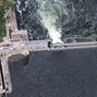 A satellite image shows extensive flooding along the Dnipro River