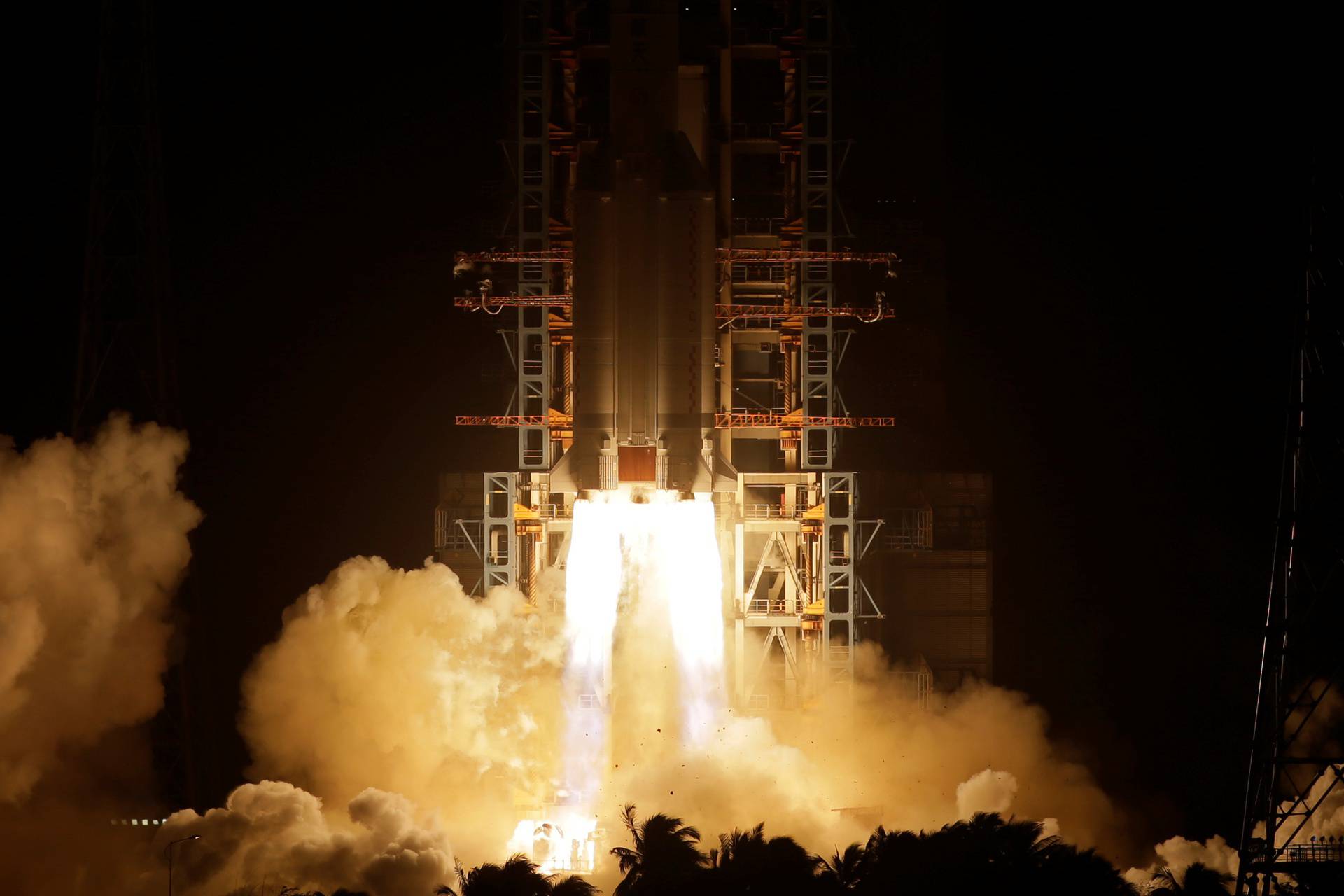 The Long March-5 Y5 rocket, carrying the Chang'e-5 lunar probe, takes off from Wenchang Space Launch Center, in Wenchang