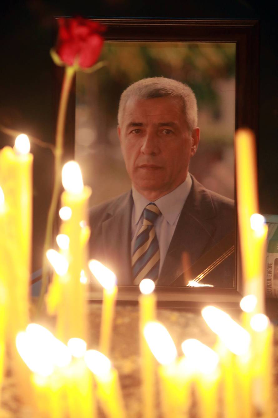 A picture of Kosovo Serb leader Oliver Ivanovic is seen during a commemoration in Kosovska Mitrovica