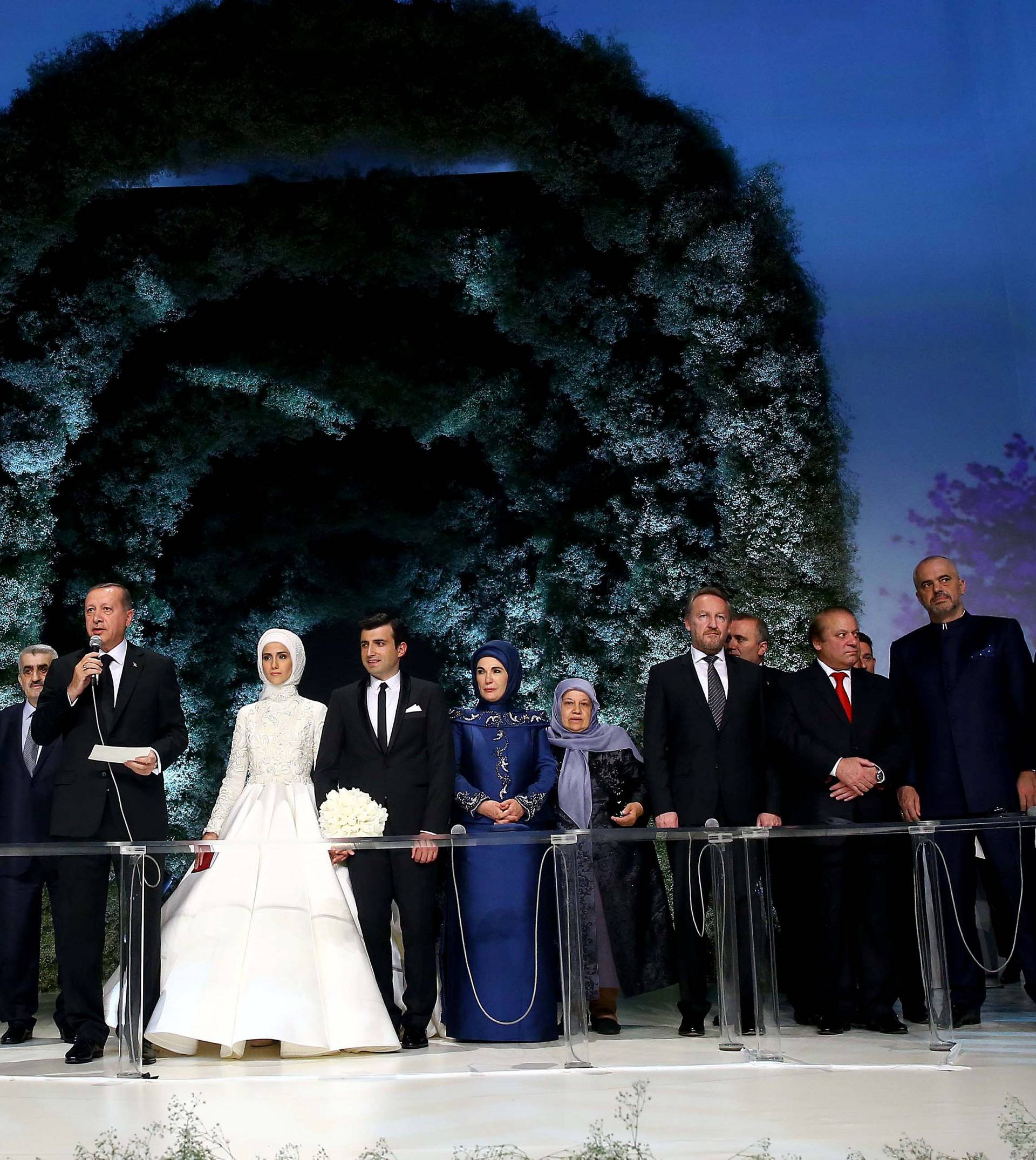 Turkish President Tayyip Erdogan speaks during the wedding ceremony of his daughter Sumeyye Erdogan and her husband Selcuk Bayraktar in Istanbul, Turkey