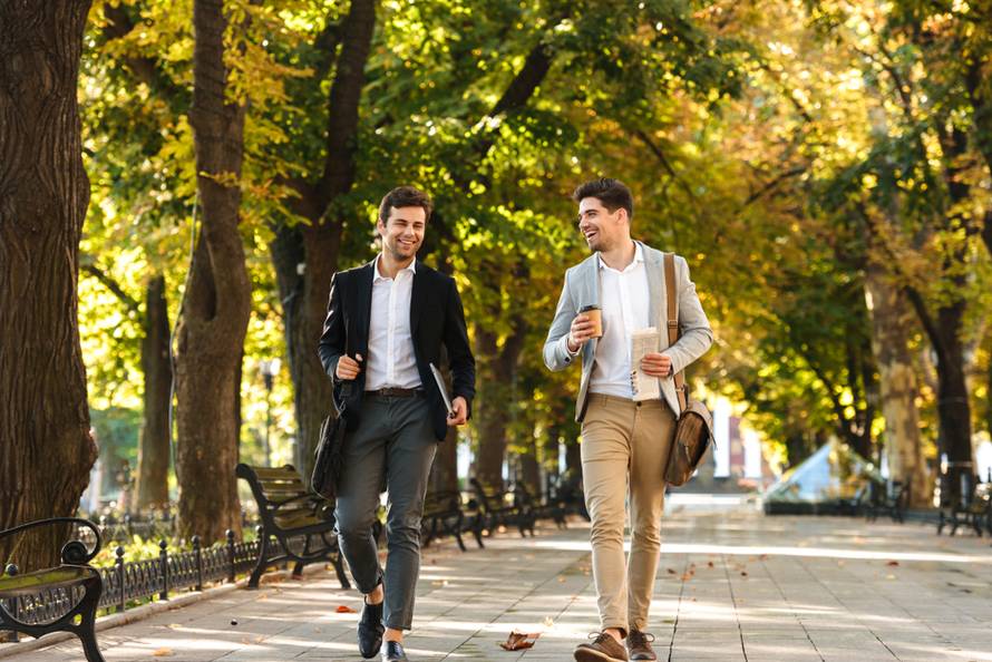 Photo,Of,Bearded,Businessmen,In,Suits,Walking,Outdoor,Through,Green