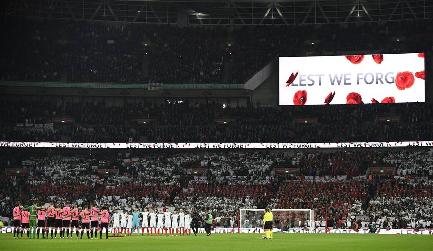 General view during a minutes silence as part of remembrance commemorations before the match