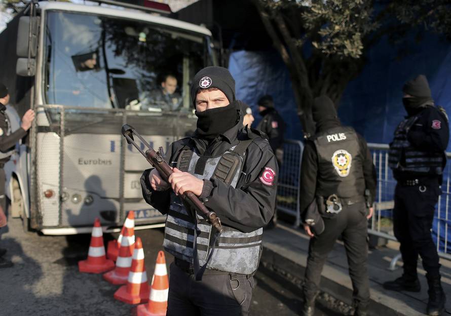 Turkish police stand guard outisde the Reina nightclub by the Bosphorus, which was attacked by a gunman, in Istanbul