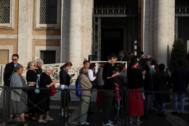 People visit the tomb of the late Pope Francis in the Papal Basilica of Saint Mary Major (Santa Maria Maggiore), in Rome