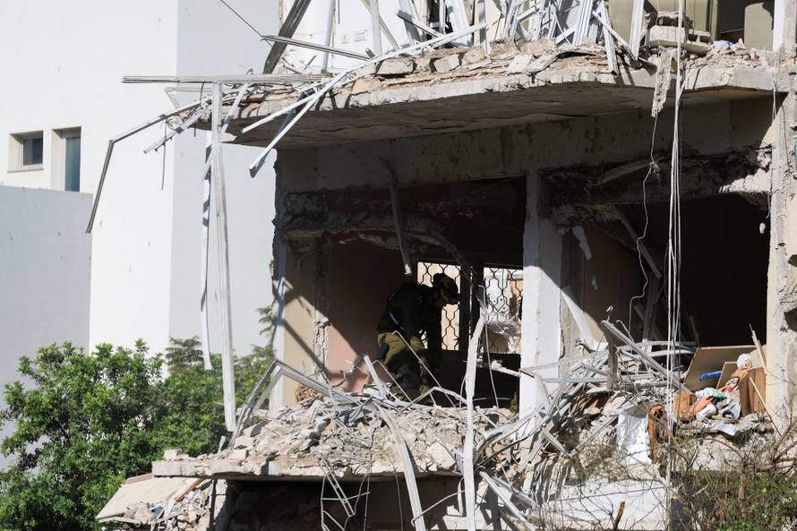 Aftermath of Iranian missile barrages in central Israel