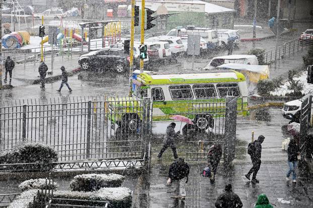 Snow falls amid low temperatures in Bolivia, in El Alto
