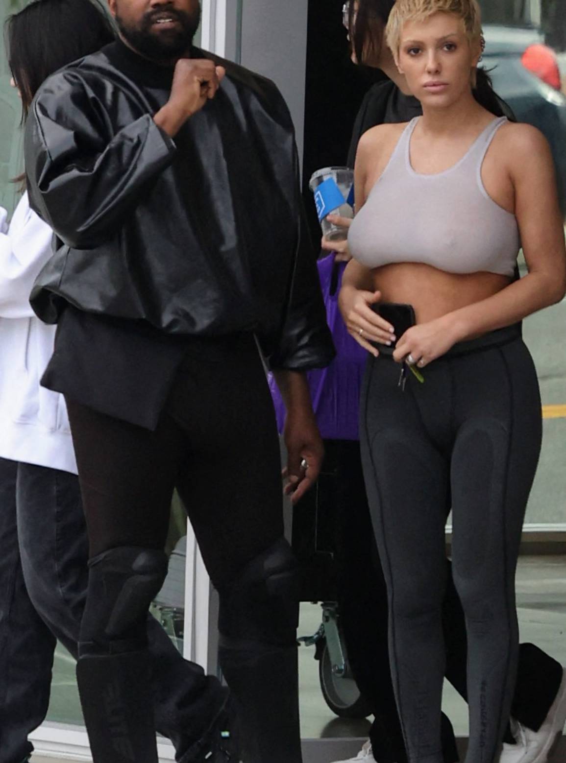 Kanye West seen in good spirits while shopping SUPREME and showing off his hummer with wife Bianca and friend