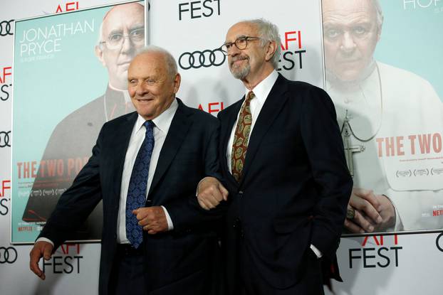 Cast members Pryce and Hopkins pose at a premiere for the film "The Two Popes" during AFI Fest 2019 in Los Angeles