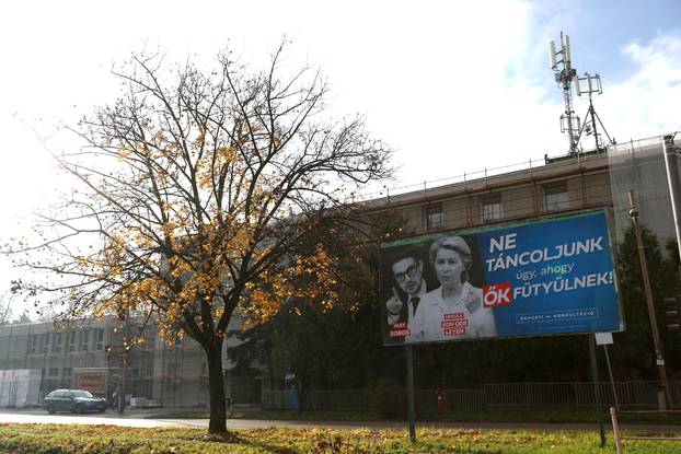 A government billboard of Soros and von der Leyen is seen in Budapest