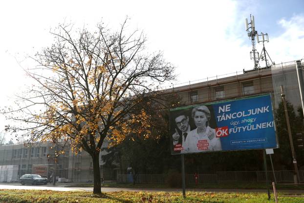 A government billboard of Soros and von der Leyen is seen in Budapest