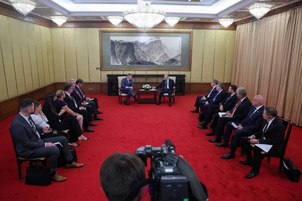 Russian President Vladimir Putin attends a meeting at Diaoyutai State Guesthouse in Beijing