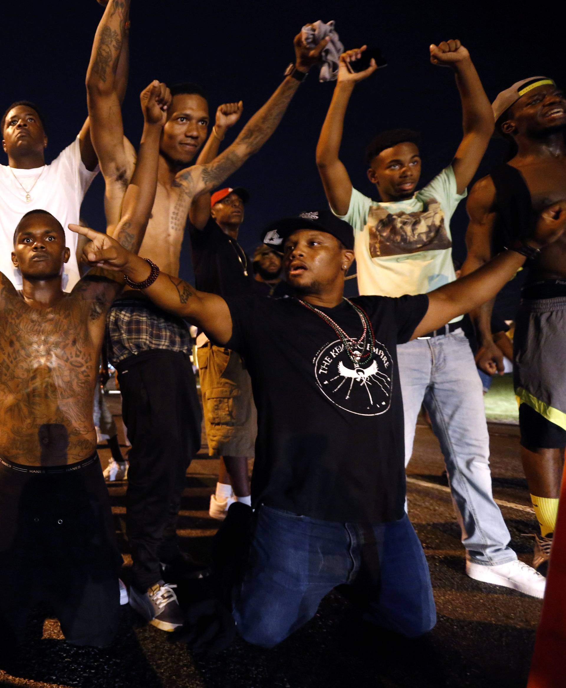 Demonstrators block traffic to protest the shooting death of Alton Sterling near the headquarters of the Baton Rouge Police Department in Baton Rouge, Louisiana