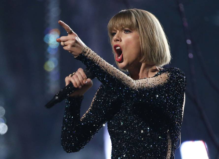 Taylor Swift performs "Out of the Woods" at the 58th Grammy Awards in Los Angeles