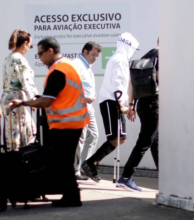 Brazilian soccer player Neymar arrives at the International Airport in Brasilia