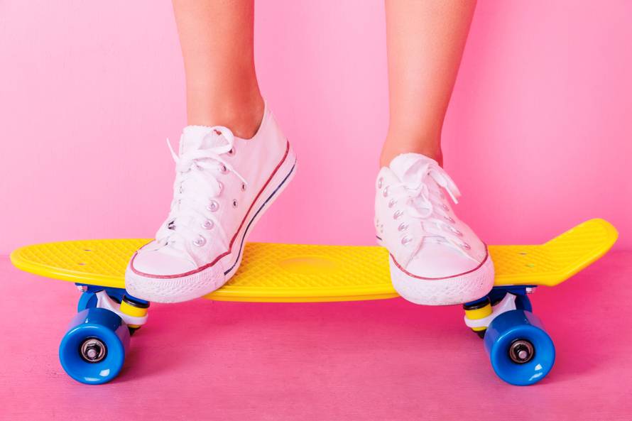 Extrem girl with skateboard