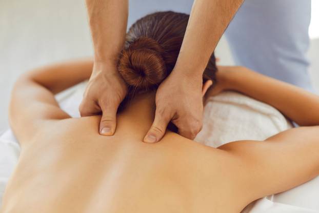 Men's,Hands,Do,A,Therapeutic,Neck,Massage,For,A,Girl