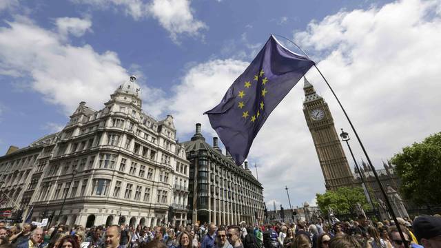 Protestors walk into Parliament Square during a 'March for Europe' demonstration against Britain's decision to leave the European Union, central London