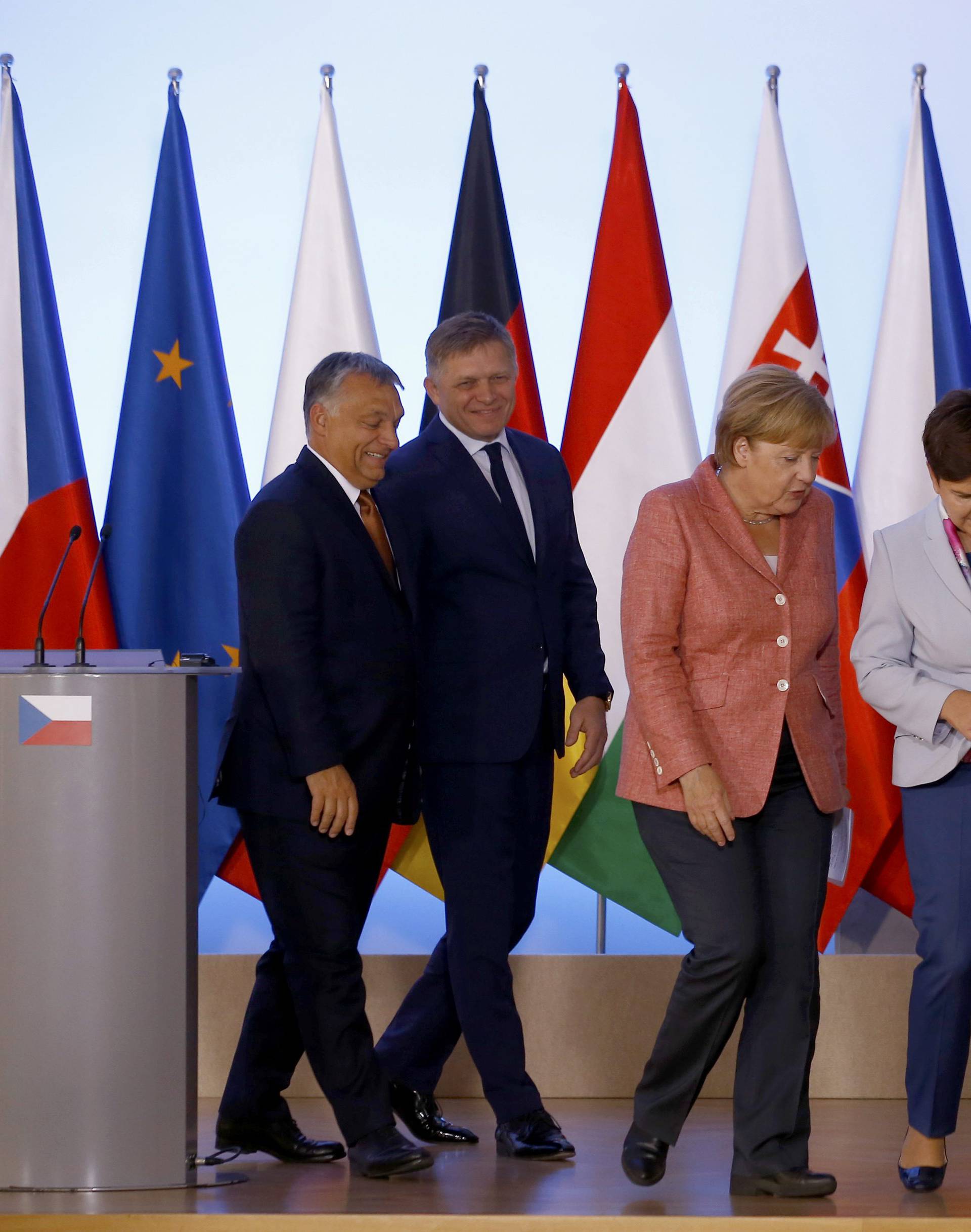 Slovakia's PM Fico, German Chancellor Merkel, Poland's PM Szydlo, Hungary's PM Orban and Czech Republic's PM Sobotka leave news conference in Warsaw