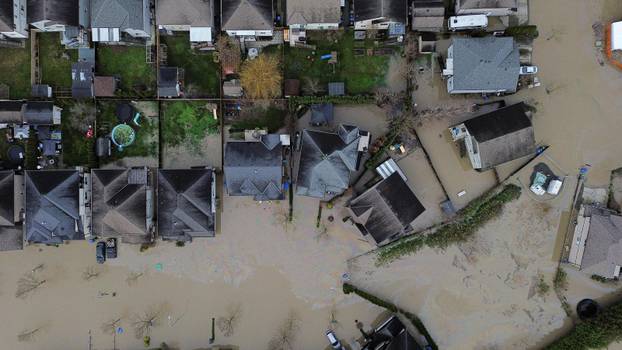 Floodwaters trigger evacuations and highway closures in British Columbia's Fraser Valley
