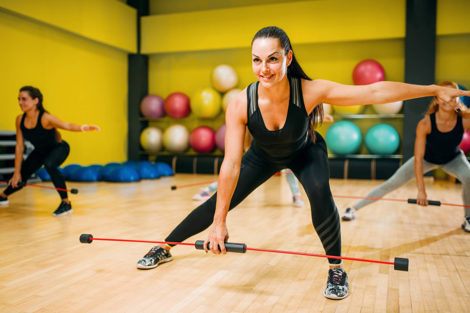 Women group exercising on fitness training