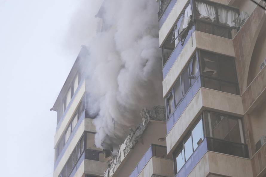 Smoke rises from a building following an Israeli air strike in Beirut