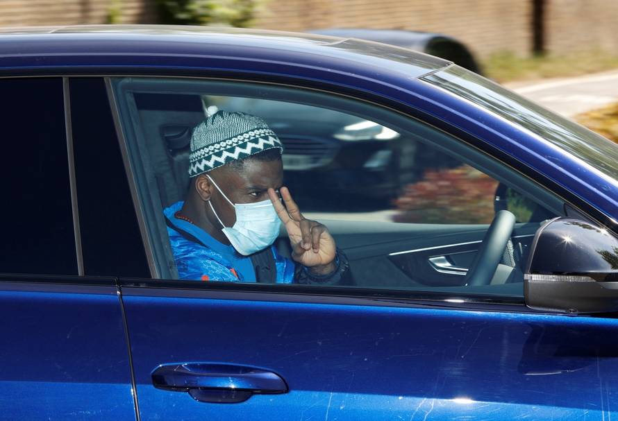 Tottenham Hotspur players and staff arrive at training following the outbreak of the coronavirus disease (COVID-19)