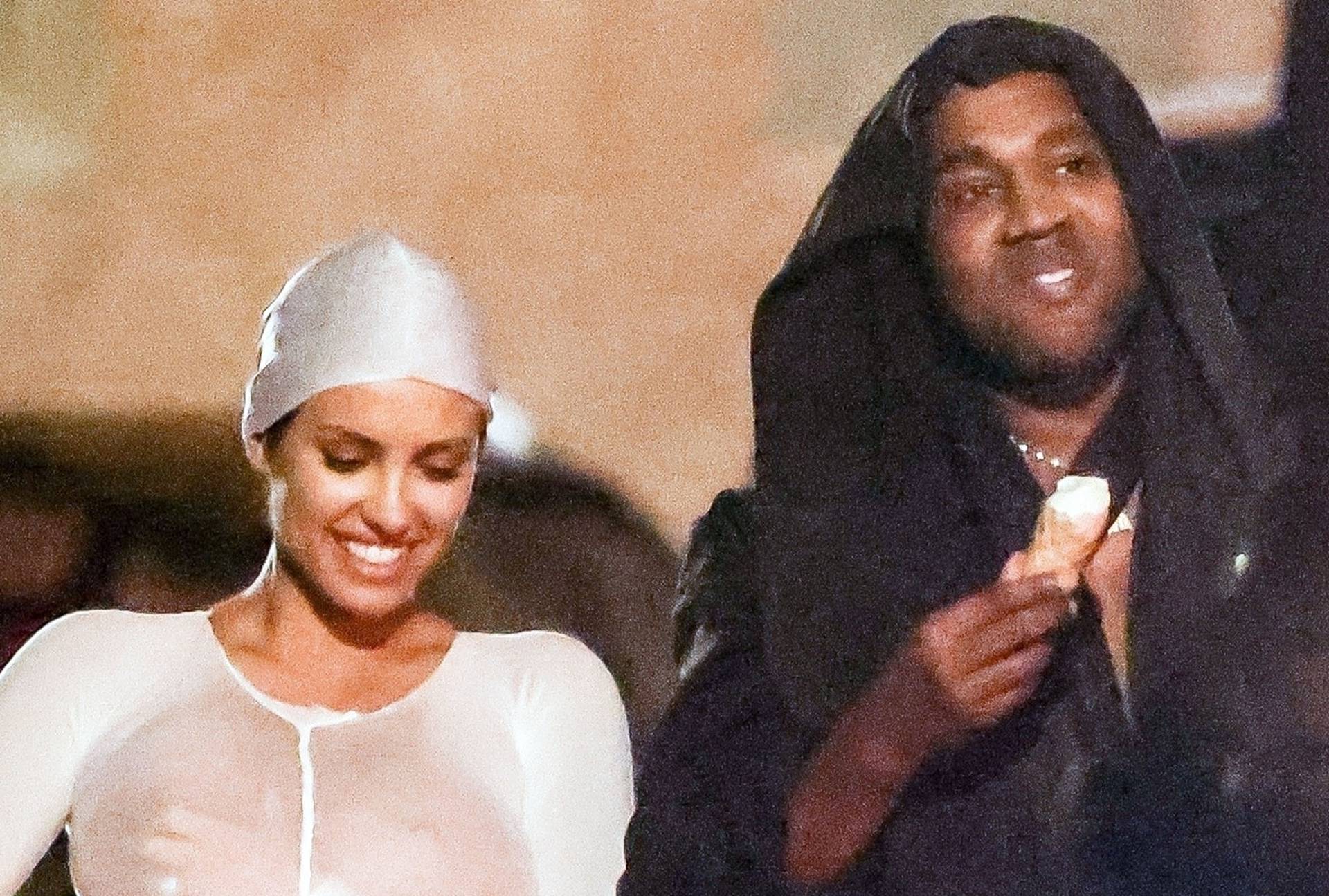 *PREMIUM-EXCLUSIVE* *MUST CALL FOR PRICING* *WEB EMBARGO UNTIL 21:00 HRS UK TIME ON 10/08/23* The American Rapper Kanye West is all smiles looking happy with his reported 'Wife' Bianca Censori as they enjoy cool scrumptious Gelato and take a stroll barefo