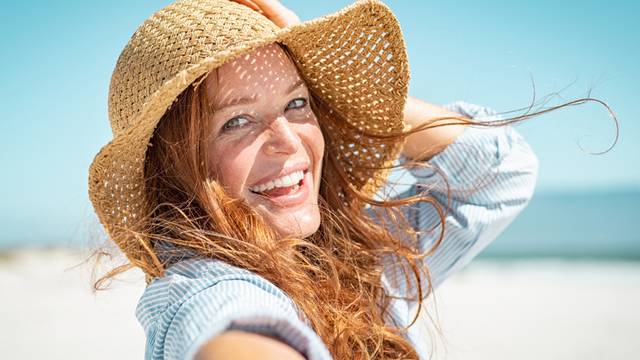 Portrait,Of,Beautiful,Mature,Woman,In,Casual,Wearing,Straw,Hat