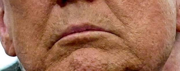 FILE PHOTO: U.S. President Donald Trump signs executive orders for reciprocal tariffs in Washington