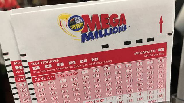 A Mega Millions ticket is pictured in a store in New York City,