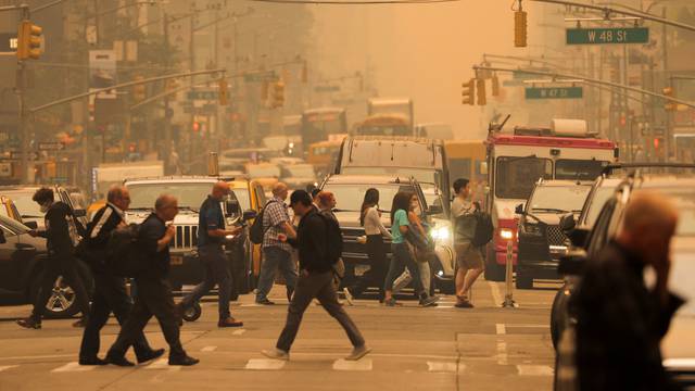 Haze and smoke caused by wildfires in Canada blanket New York City