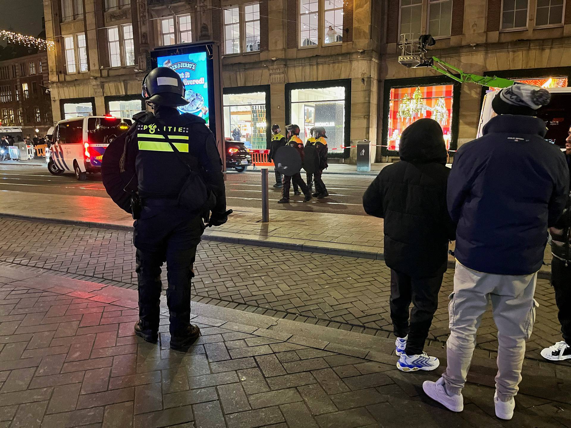 Israeli football supporters are guarded by police after violence targeting Israeli football fans broke out in Amsterdam overnight, in Amsterdam