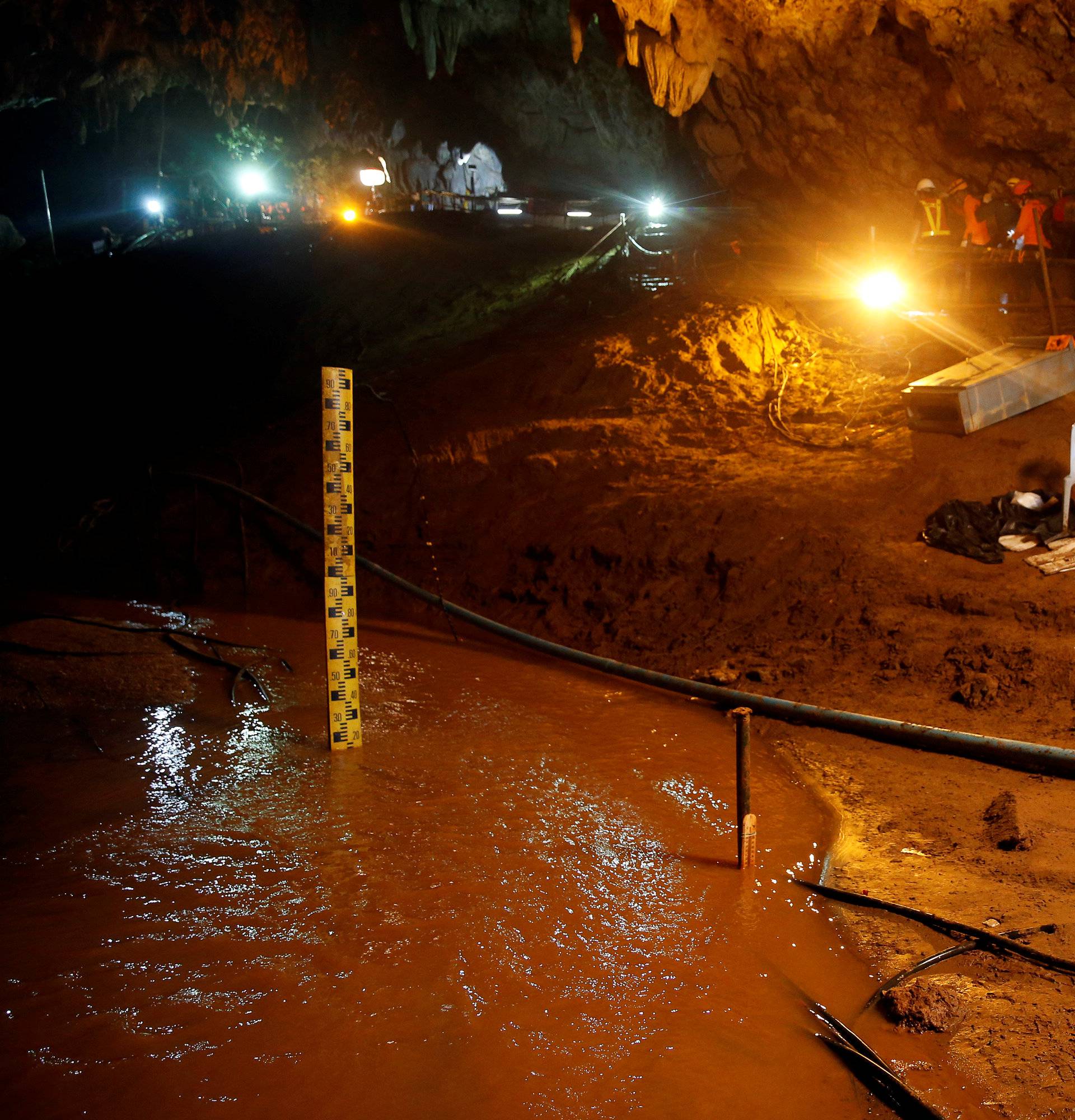 Rescue workers take out machines after 12 soccer players and their coach were rescued in Tham Luang cave complex in the northern province of Chiang Rai