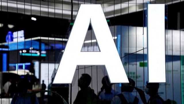 FILE PHOTO: An AI (Artificial Intelligence) sign is seen at the World Artificial Intelligence Conference (WAIC) in Shanghai
