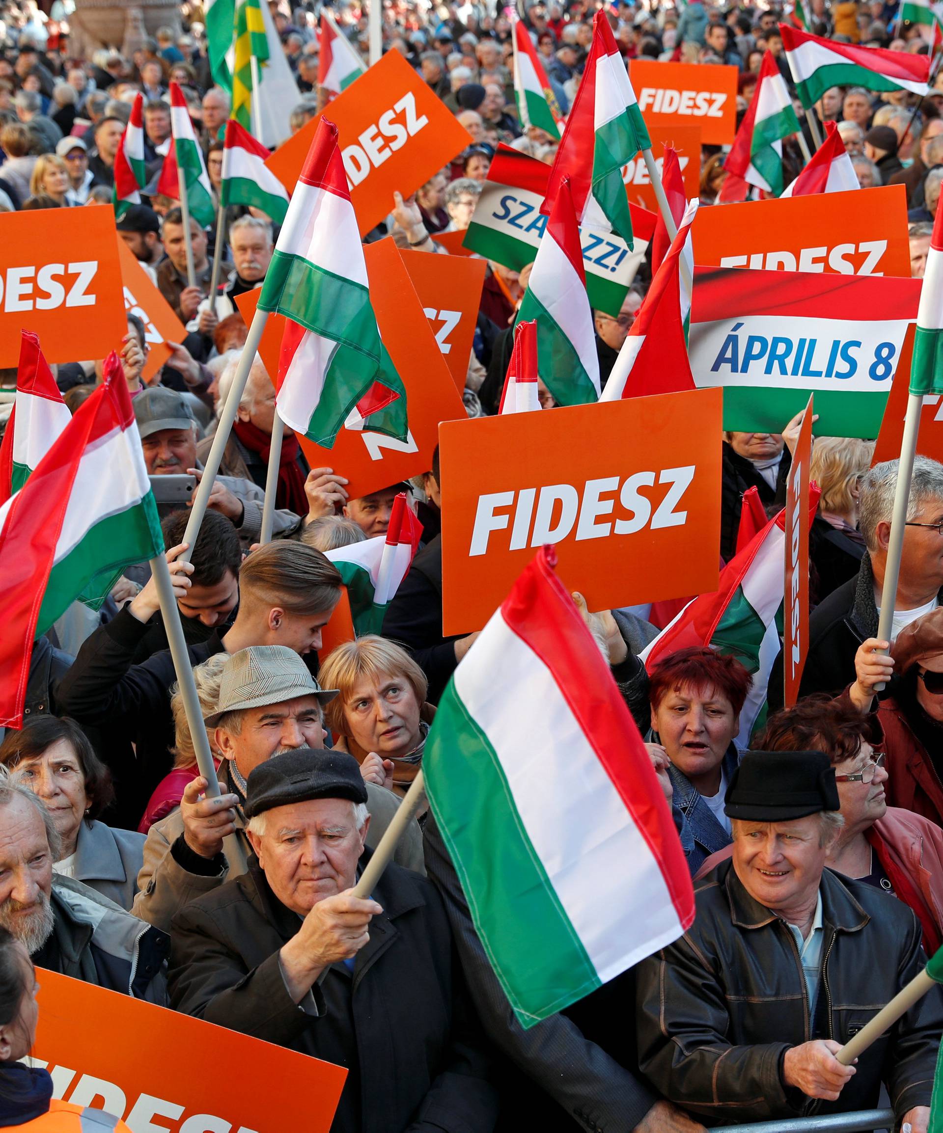 Supporters of Hungarian Prime Minister Viktor Orban are seen before his campaign closing rally in Szekesfehervar