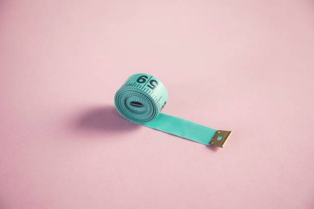 green meter on pink background