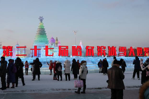 People visit the annual Ice and Snow Festival in Harbin