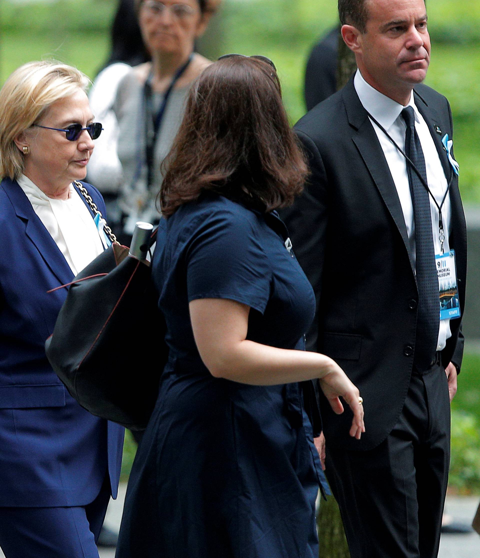 U.S. Democratic presidential candidate Hillary Clinton arrives for ceremonies to mark the 15th anniversary of the September 11 attacks at the National 9/11 Memorial in New York