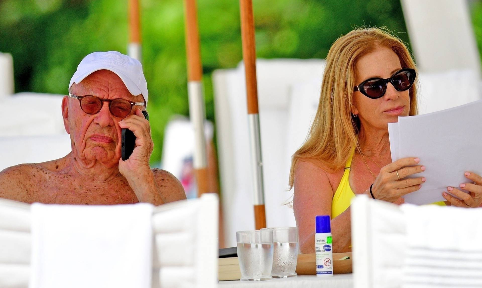 *PREMIUM-EXCLUSIVE* *MUST CALL FOR PRICING* The Australian-American business magnate Rupert Murdoch laps up the hot Caribbean sunshine with his scantily-clad mystery woman and billionaire pal Anthony Bamford out on the beaches of Barbados.