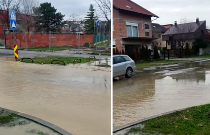 U Zagrebu pukla cijev: Cesta je potopljena, voda šiklja kao luda