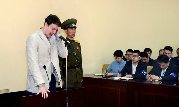 FILE PHOTO: KCNA picture shows U.S. student Otto Warmbier crying at court in an undisclosed location in North Korea