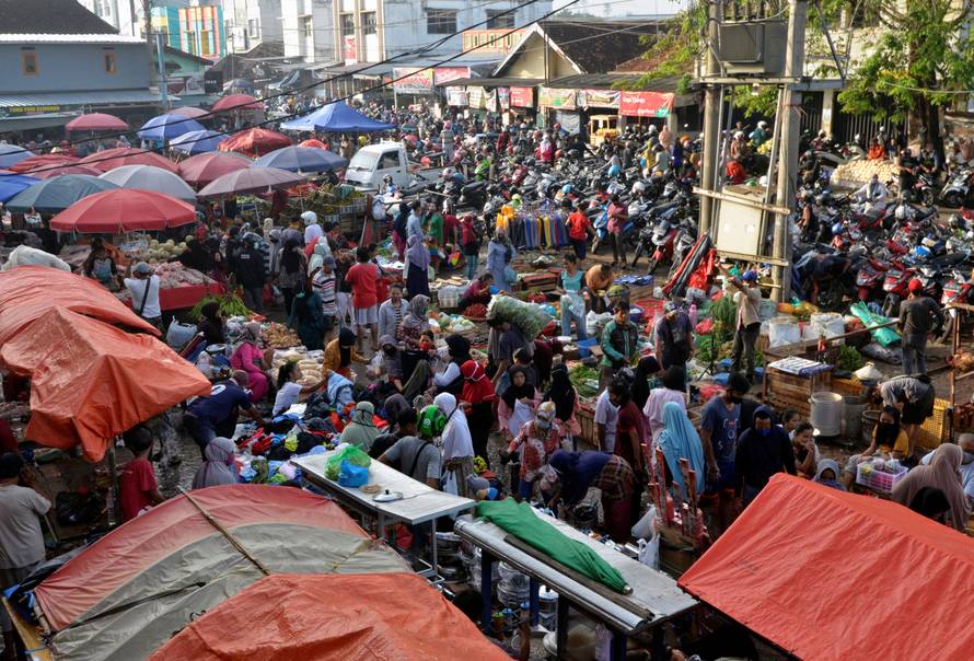 People visit traditional market ahead of Eid al-Fitr celebrations in Bandar Lapmpung