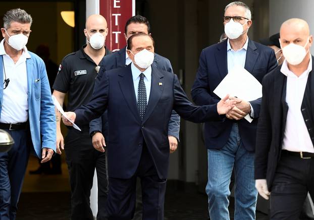 Former Italian Prime Minister Silvio Berlusconi is discharged from Milan
