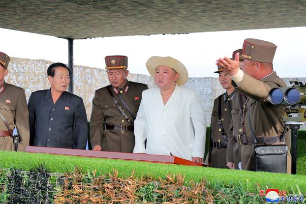 North Korea's leader Kim Jong Un oversees military drills at an undisclosed location in North Korea