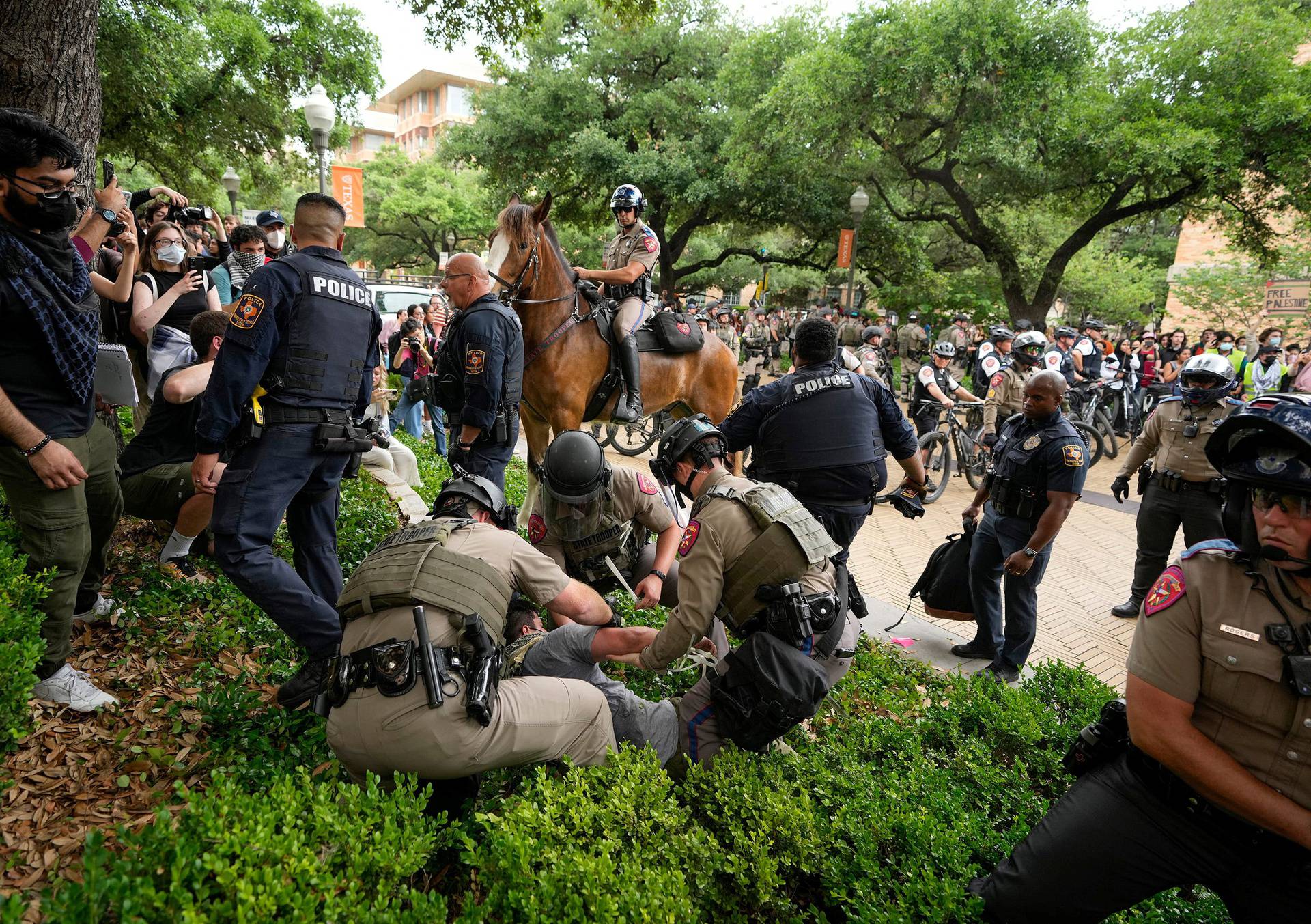 Texas state troopers arrest a man at a pro-Palestinian protest at the University of Texas