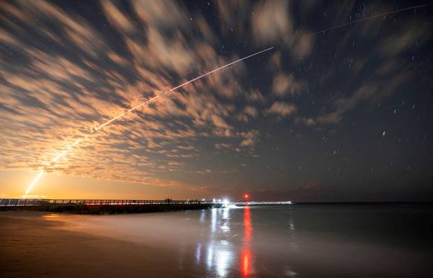 FILE PHOTO: Starlink satellites launch from Cape Canaveral