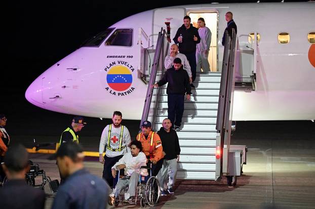 Venezuelan migrants arrive on a deportation flight from the U.S. at the Simon Bolivar International airport in Maiquetia