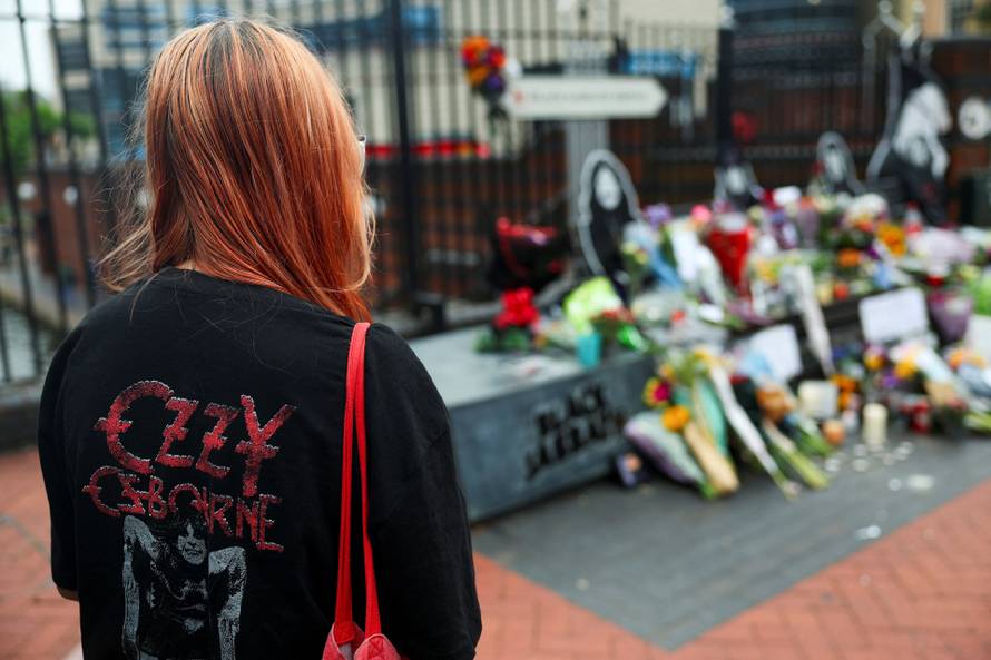 Fans pay tribute following the death of Ozzy Osbourne, in Birmingham